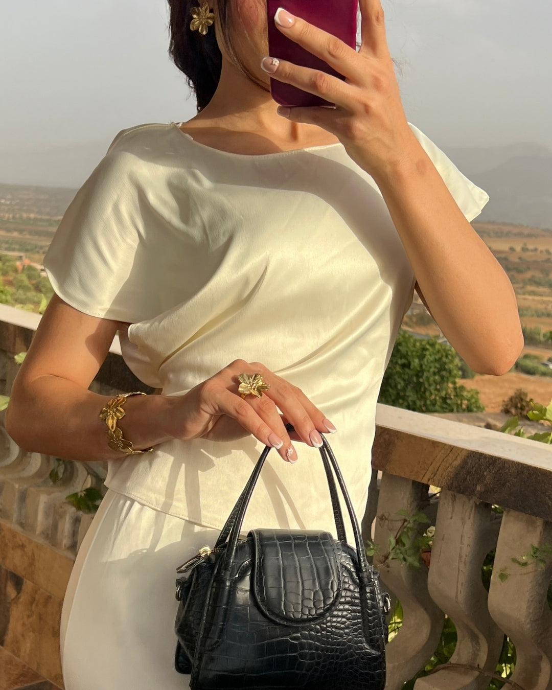 Blouse en satin ceinturée